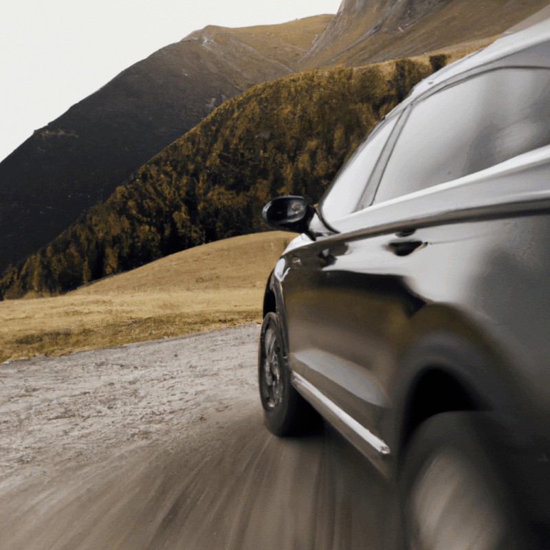 modern SUV on a scenic mountain road, sleek design with metallic finish, spacious interior with advanced technology features, dynamic driving on a winding road, adventurous outdoor setting, rugged yet stylish